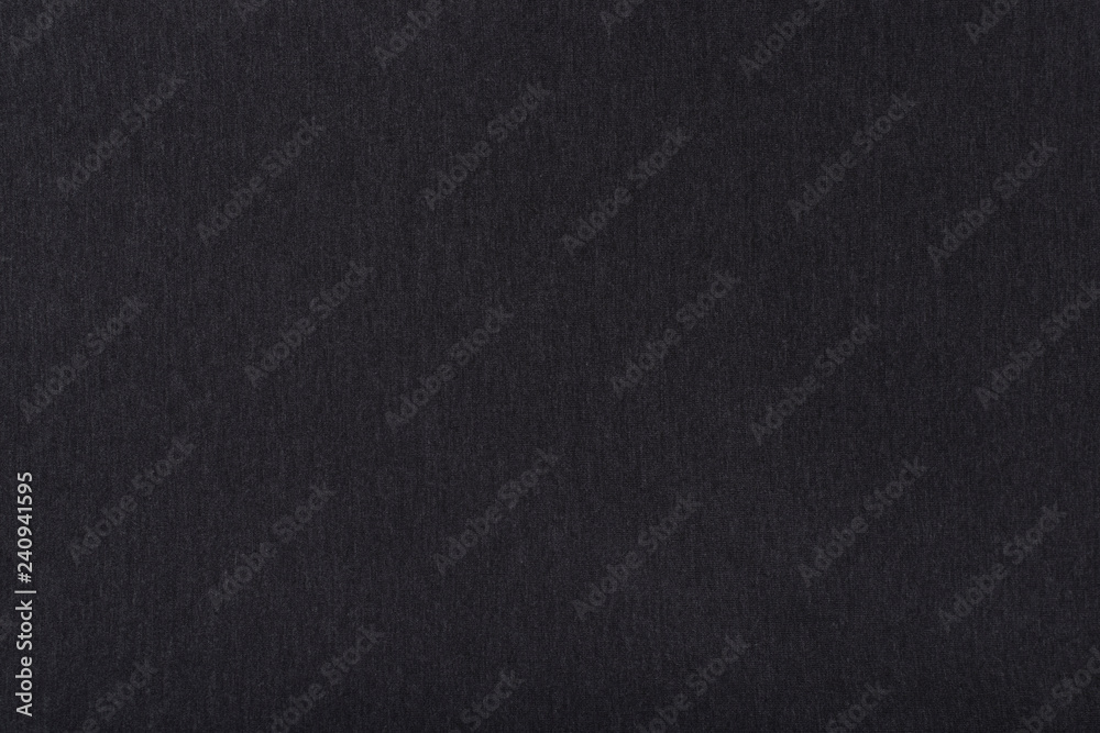 Background of dark gray fabric. Close-up. Background of dark gray fabric. Close-up.