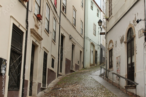 Rua estreita na zona antiga de Coimbra, Sé Velha. photo