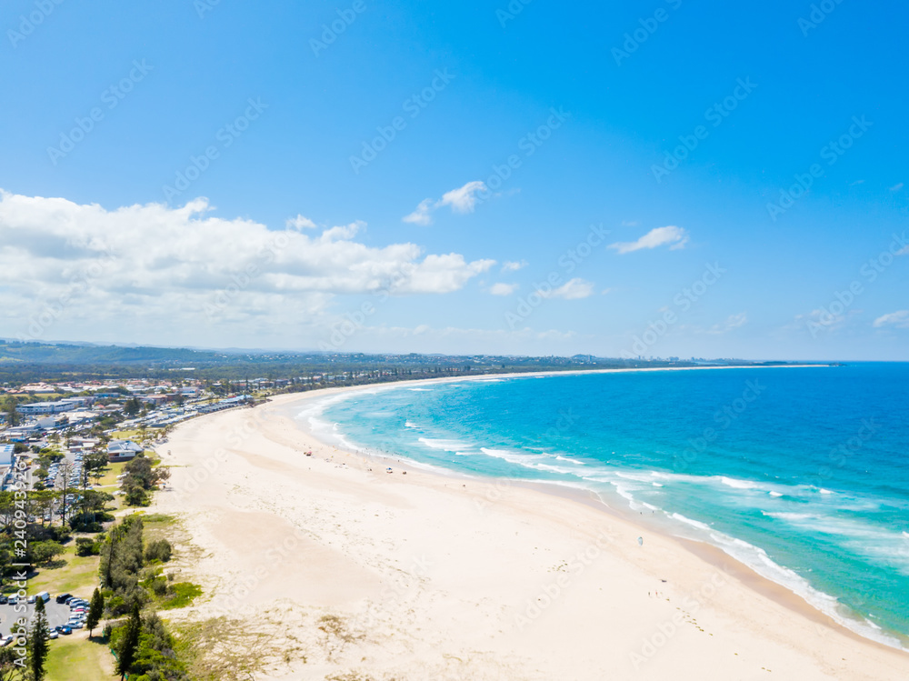 Kingscliff and Cudgen Creek from an aerial view with blue water on a clear day in NSW, Australia 