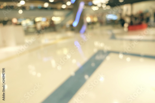 blurred image of shopping mall and people, in department store