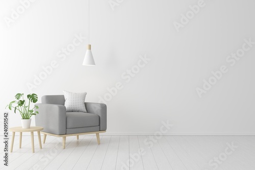 Minimal concept. interior of living grey fabric armchair, wooden table on wooden floor and white wall. photo