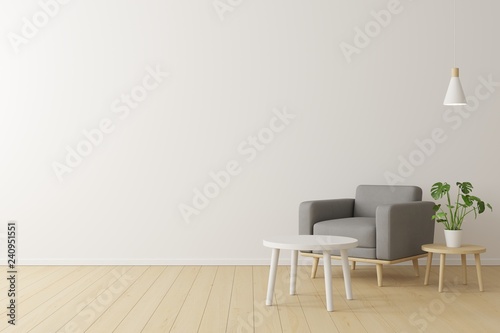 Minimal concept. interior of living grey fabric armchair, wooden table on wooden floor and white wall.