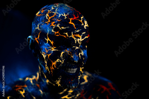 Man's  Face Painted in Neon UV Lava