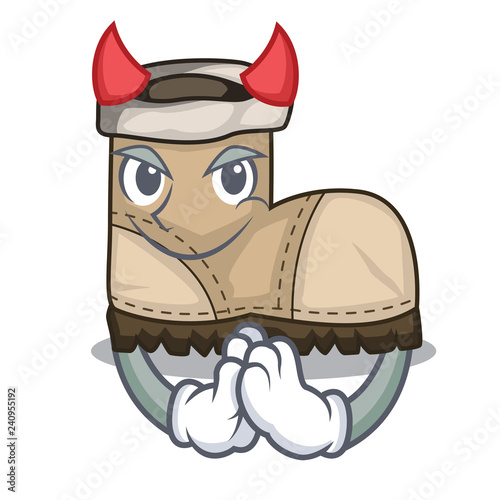 Devil working boot above a character rak
