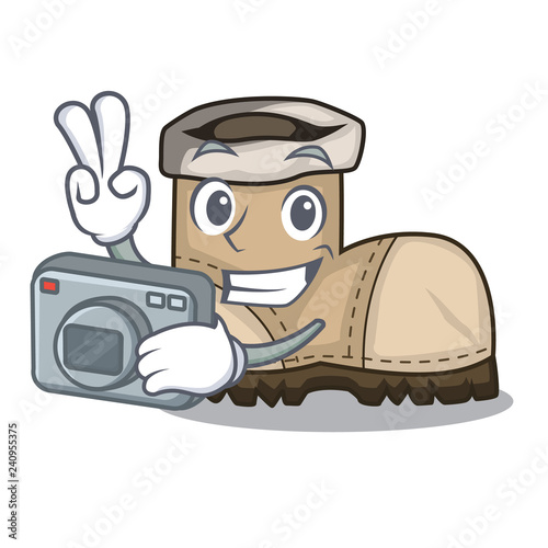 Photographer working boot above a character rak