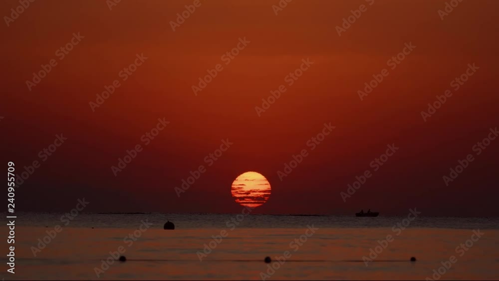Boat floats on horizo.Sunrise Over Calm Sea. Orange Beach Sunrise.Amazing Sunrise On The Beach With Beautiful Sky In Purple Colors.Sunset Beach Sky Sea Landscape Water Ocean Background Sunrise Sun Boat floats on horizo.Sunrise Over Calm Sea. Orange Beach Sunrise.Amazing Sunrise On The Beach With Beautiful Sky In Purple Colors.Sunset Beach Sky Sea Landscape Water Ocean Background Sunrise Sun