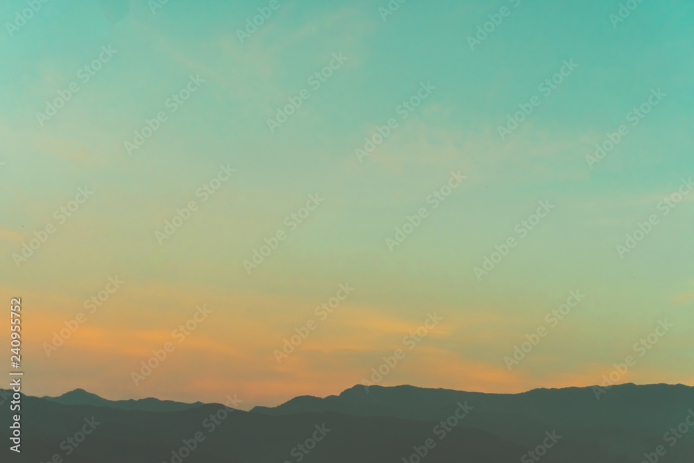 Mountain scenery view landscape with twilight sky beautiful magenta color tone theme sunset and sunrise background.