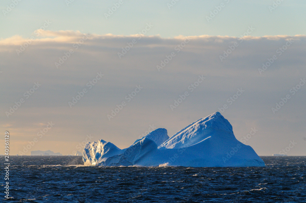 Antarctic Sunset: Floating Icebergs in the Weddell Sea, near the Antarctic Peninsula, as seen from an Antarctic Exploration Ship