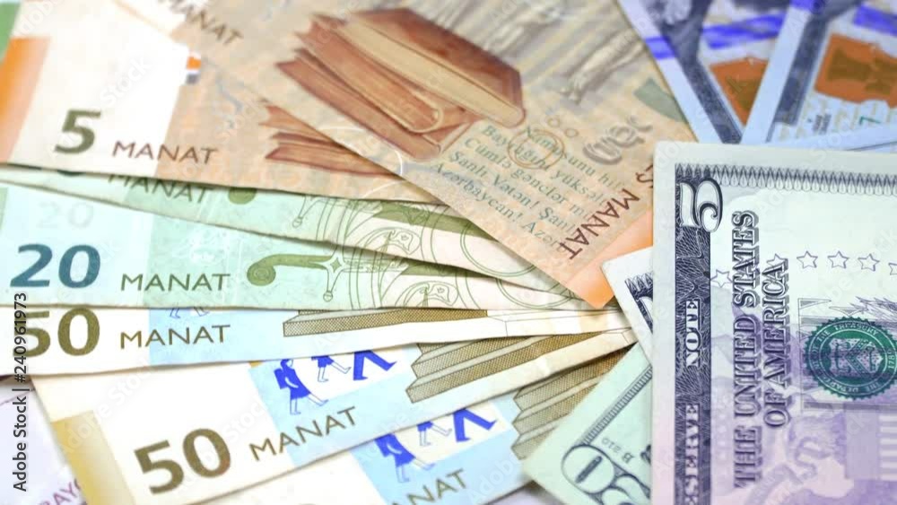 The Azerbaijani manats and dollars on the rotating table. 4K The Azerbaijani manats and dollars on the rotating table. 4K