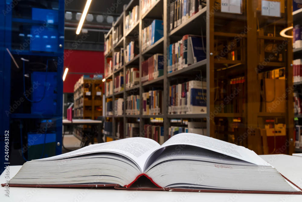 library concept for university or school. books ,table ,chair in the library. library concept for university or school. books ,table ,chair in the library.