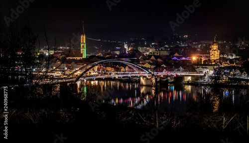 Christmas market at night with reflections at Vilshofen-Danube-Bavaria-Germany