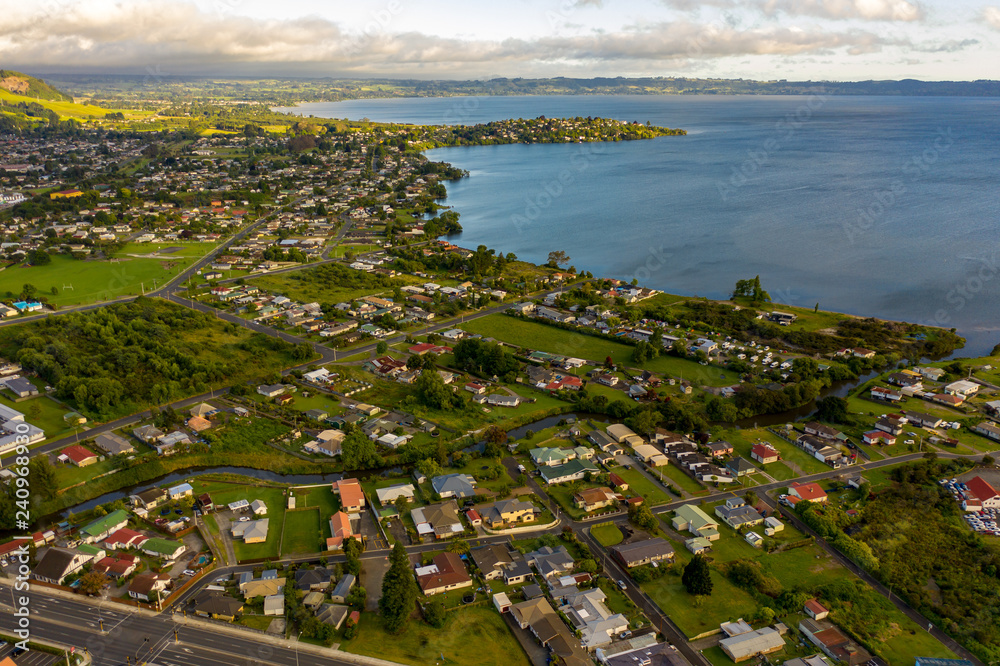 Lake Rotorua and City in early morning, Aerial view