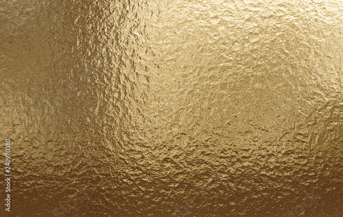 Gold metallic background, linen texture, bright festive background photo