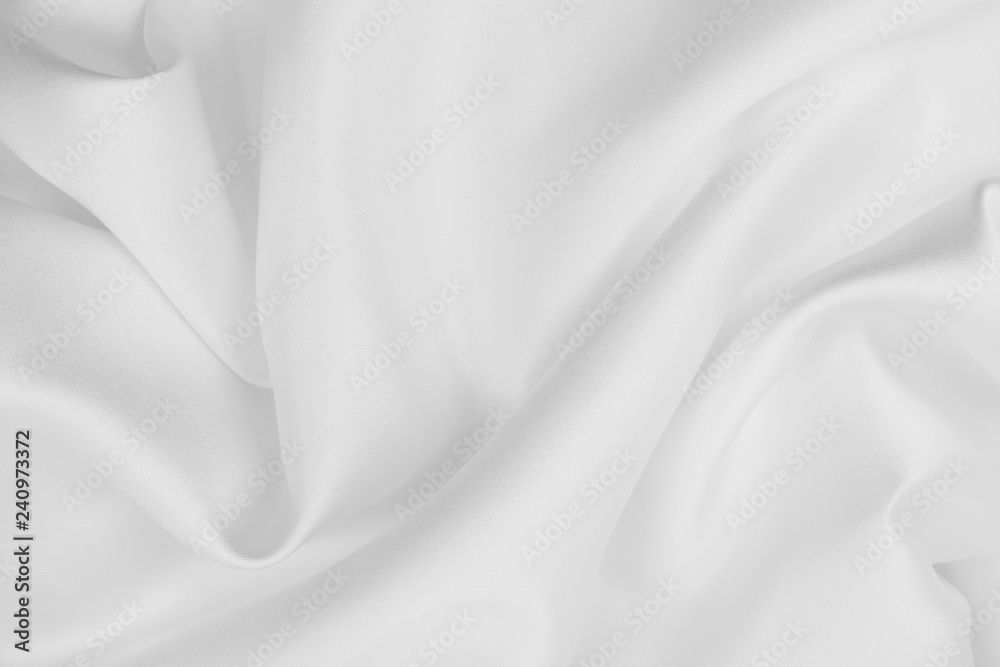 Fototapeta premium Smooth elegant white silk or satin luxury cloth texture as wedding background. Luxurious background design