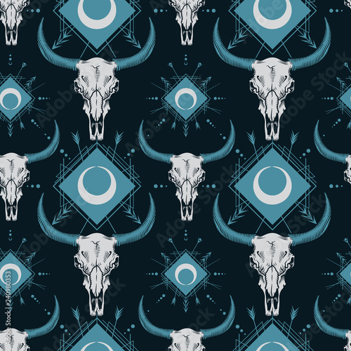 Vector seamless pattern with bull skulls in engraving technique and boho ornament. 