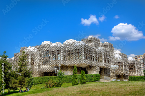 Pristina, Kosovo - June 2nd 2018 - The amazing library of Pristina in a amazing blue sky day in Kosovo photo