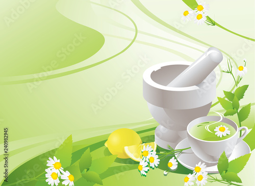 White mortar with pestle and cup with green tea.