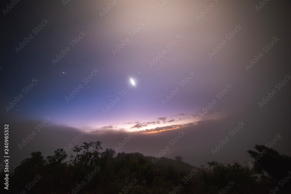 Starlight on the top of a foggy mountain