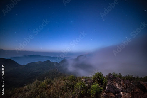 starlight at the top of a foggy mountain