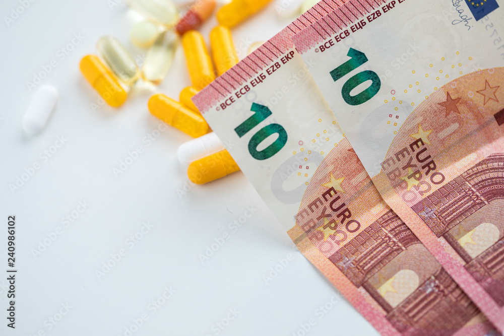 Geld für Drogen Doping Leistungssteigerung durch gelben und weißen Pillen  Kapseln und Tabletten Stock Photo | Adobe Stock