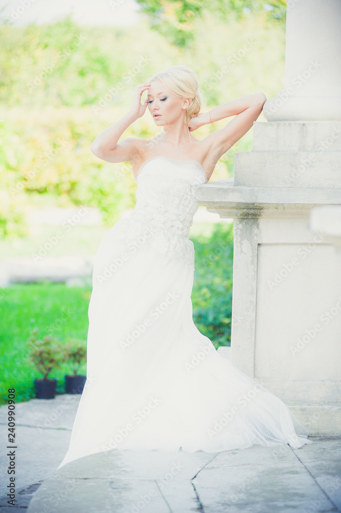 Beautiful bride sensual portrait before wedding ceremony