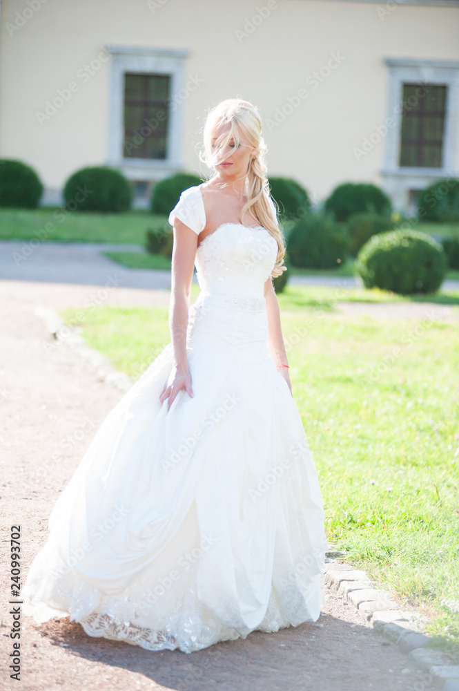 Beautiful sensual bride blonde in wedding dress Beautiful sensual bride blonde in wedding dress