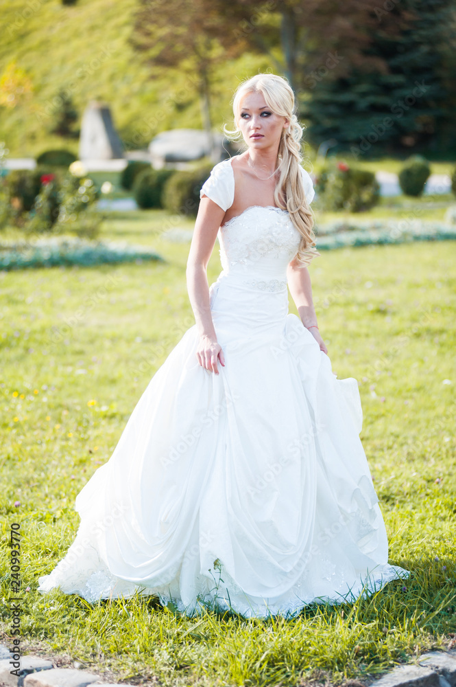 Beautiful sensual bride blonde in wedding dress Beautiful sensual bride blonde in wedding dress