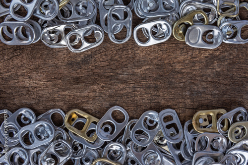 Ring can on wood background.