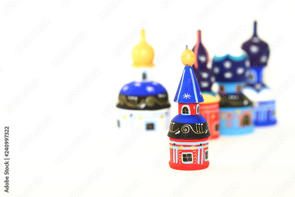 Shallow focus Set of wood painted cupola tower toy, orthodox towers toy, mausoleum toy, souvenir russian style isolated on white background.