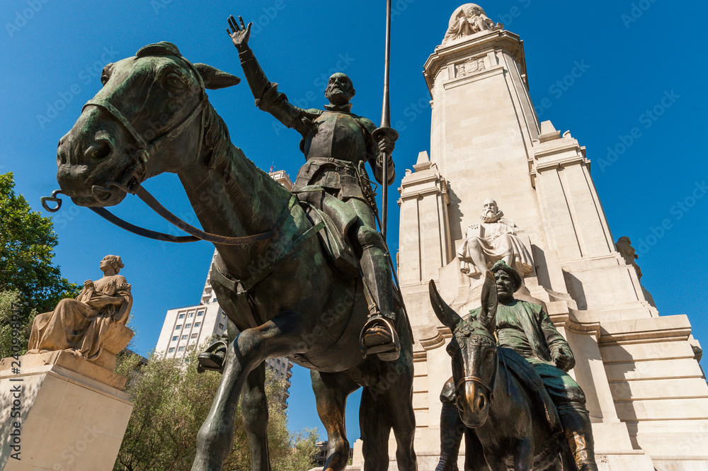 Bronze sculptures of Don Quixote and Sancho Panza at the Cervantes monument, Plaza de Espana, Madrid, Spain