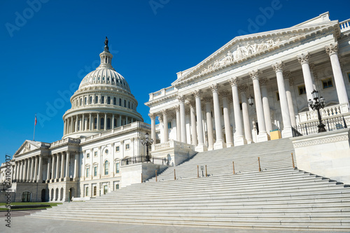 Obraz na płótnie Wide empty view of the Capitol Building in Washington DC, USA under bright blue