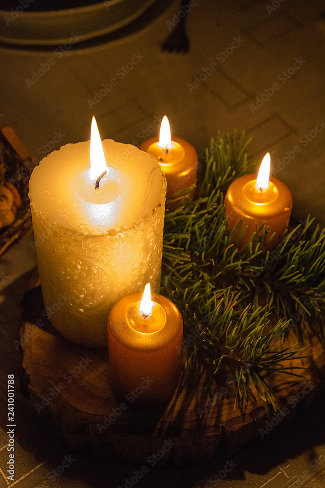 Christmas wreath with burning candles