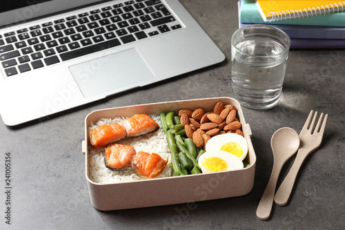 Container with natural protein food on office table