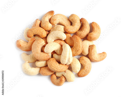 Tasty cashew nuts isolated on white, top view