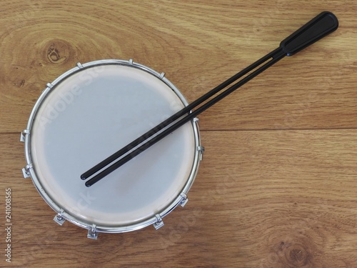 Tamborim with drumstick, a Brazilian musical percussion instrument, widely used to accompany samba, the famous Brazilian rhythm. It has a great prominence in the Brazilian carnival.