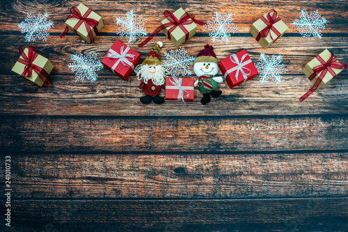 Christmas Gift boxes on the dark wooden background