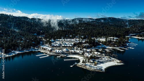 Aerial, drone view of Lake Arrowhead, California on a winter's day after a snow storm