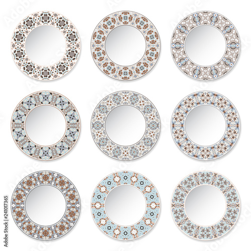 Set of nine decorative plates with a circular colored pattern, top view. White background. Vector illustration.
