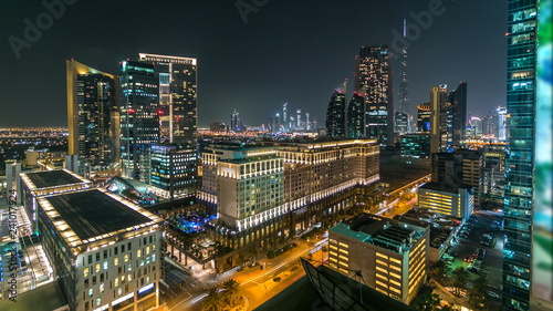 Scenic Dubai downtown architecture at night timelapse. Aerial view of  numerous skyscrapers near Sheikh Zayed road.