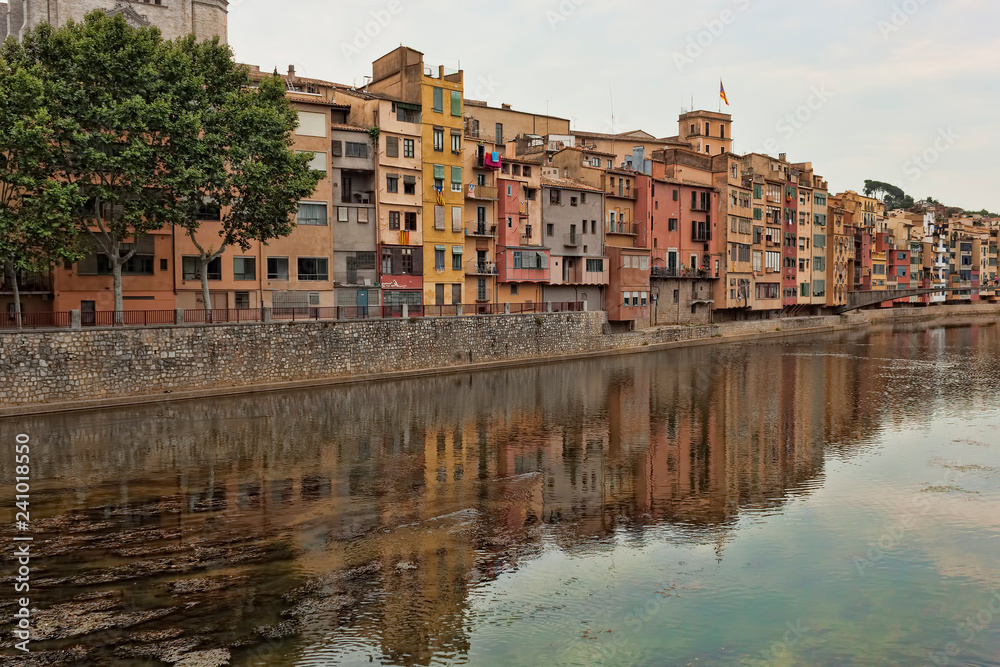 Quay Girona on July 17, 2013. Well preserved since the Middle Ages the historic core of the city attracts a significant number of tourists