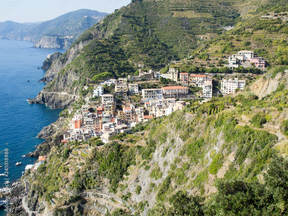 Cinque Terre, Riomaggiore village from above with coast line, Liguria, Italy