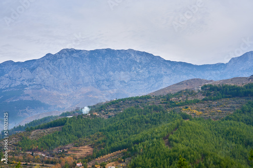 Mountains near Alanya, Turkey under a cloudy sky. 