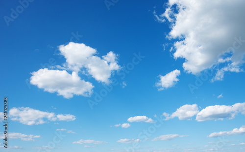 White clouds in blue sky.