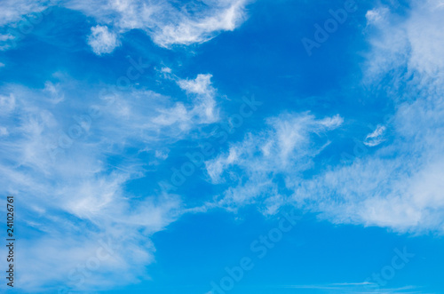 White clouds in blue sky.