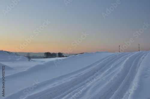winter landscape with road and blue sky © Alla Dmitriuk