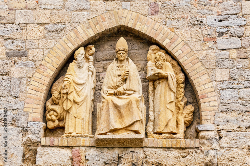 16 OCTOBER 2018, VOLTERRA, ITALY: Roman Pope statue at the cathedral wall