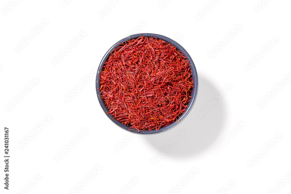 Saffron in bowl isolated on white background Saffron in bowl isolated on white background