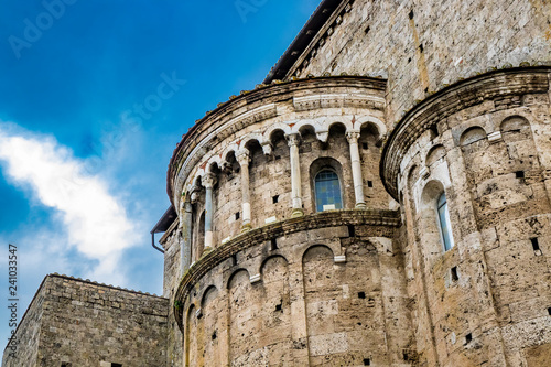 Closeup of the apses of the Cathedral Basilica of Santa Maria Annunziata, in Piazza Innocenzo III. Stone buildings from the Middle Ages. Anagni, Frosinone, Italy.