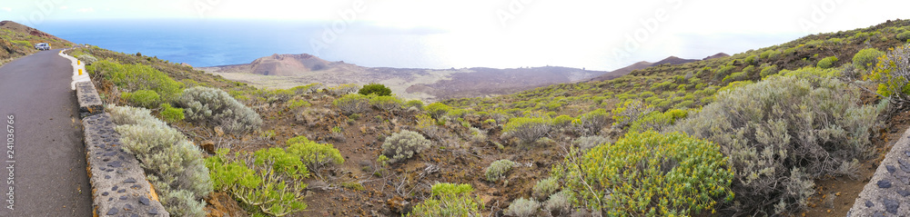 Extinct volcano rim visible above La Restinga village on El Hierro Island Canaries Spain Extinct volcano rim visible above La Restinga village on El Hierro Island Canaries Spain