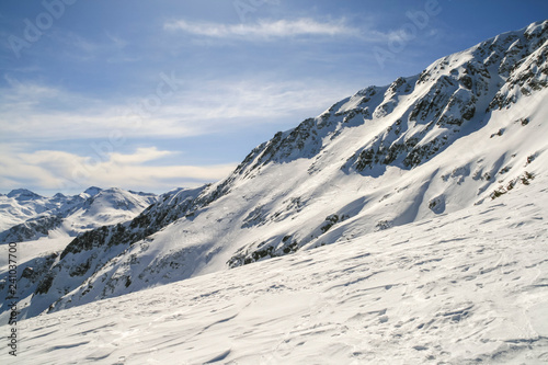 Winter landscape with hills covered with snow at Pirin Mountain, view from Todorka peak, Bulgaria